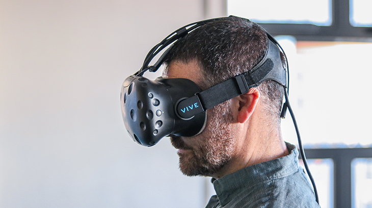 Man uses virtual reality headset
