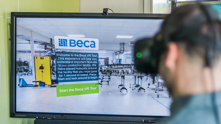 Man wears virtual reality headset demonstrating Beca's manufacturing module